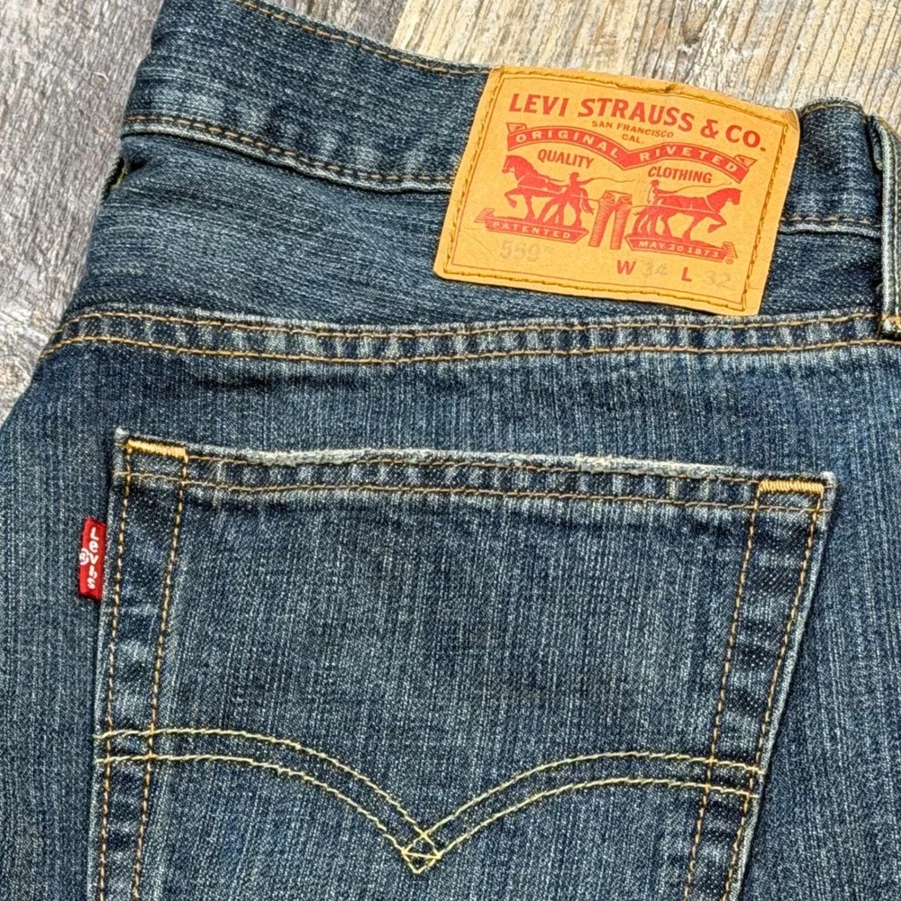 Levis 559 Mens Relaxed Straight Leg Blue Rust Denim Jeans 34x32 Medium Wash